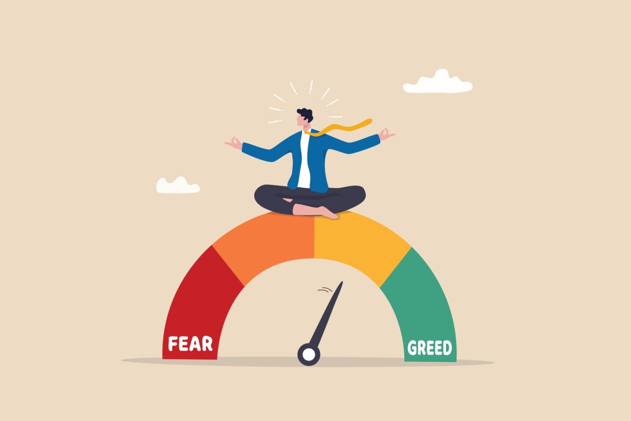 Das Bild zeigt einen Anleger, den auf dem Fear and Greed Index sitzt um eine kluge Investmententscheidung zu treffen