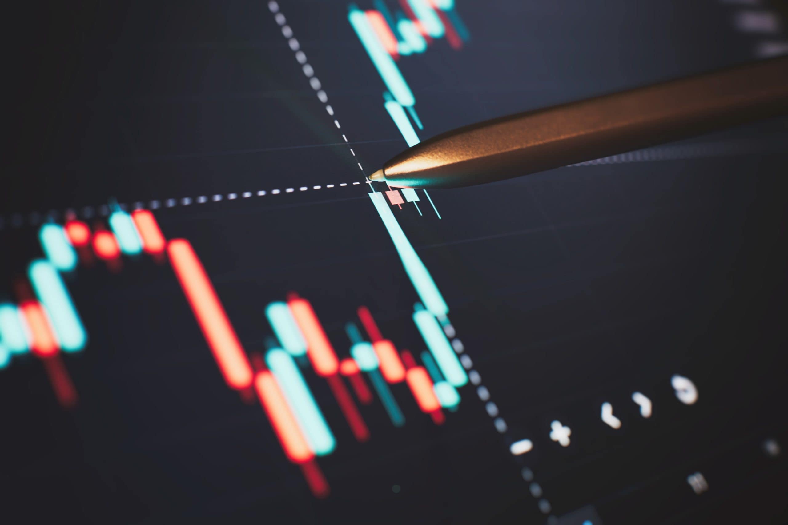 Weißer Abwärtspfeil auf rotem Hintergrund mit Börsenzahlen, die auf einen Rückgang der Finanzmärkte hinweisen.
