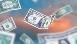 Dollar bills falling to the ground