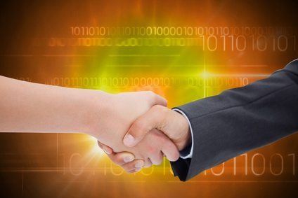 Composite image of close up of a handshake