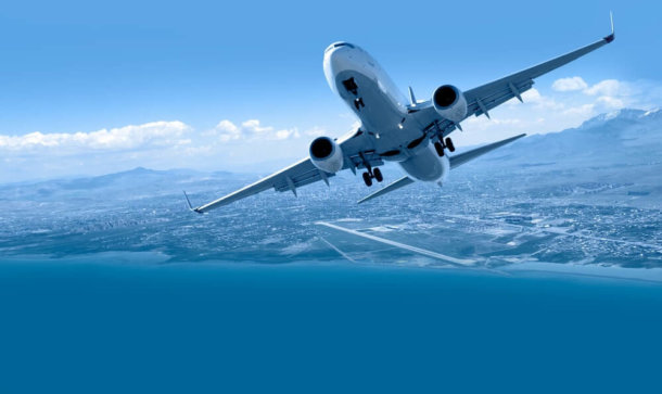 Krypto-Gigant Binance hat es nun auf die Reisebranche abgesehen Man sieht ein Flugzeug, das in der Luft weiter nach oben steigt.