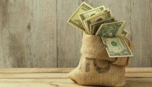 Ein prall gefühlter Geldsack, symbolisch für das Token-Funding