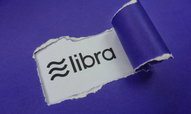 Libra Association bekommt strategisch wichtigen Neuzugang libra-symbol erscheint unter einem riss in einem blauen papier