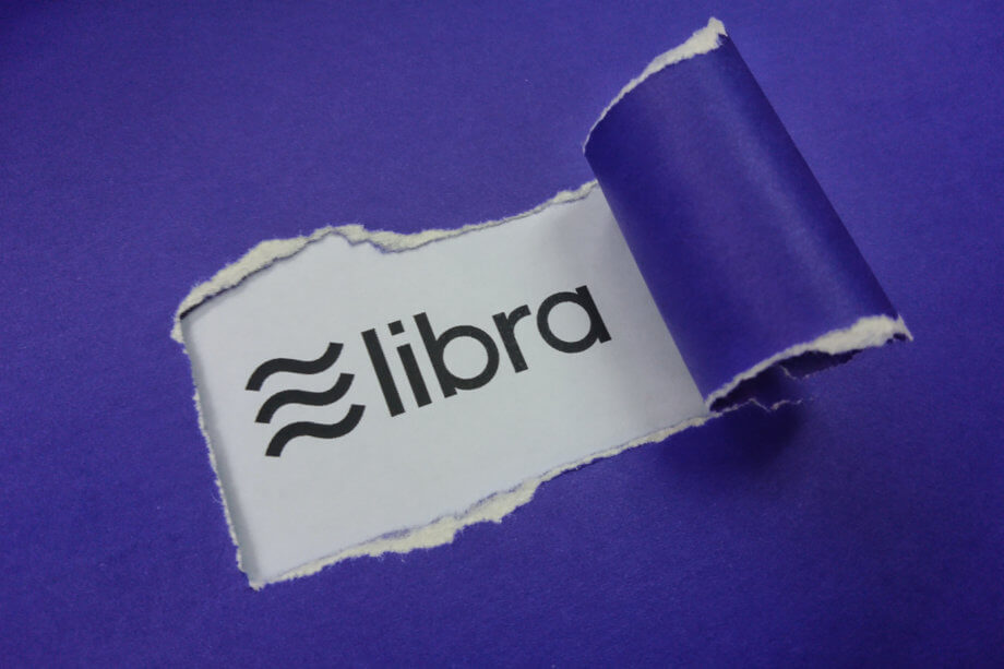 Libra Association bekommt strategisch wichtigen Neuzugang libra-symbol erscheint unter einem riss in einem blauen papier