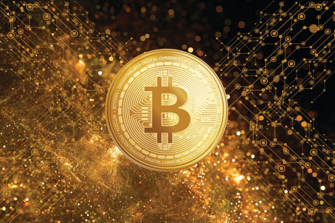 bitcoin-münze golden vor technologischem Hintergrund