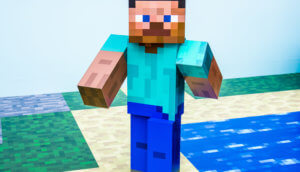 Eine Figur im Minecraft-Stil die an einem Stück Wasser vorbeiläuft