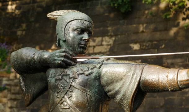 Robinhood ergattert 280 Millionen US-Dollar statue von robin hood vor einer wand
