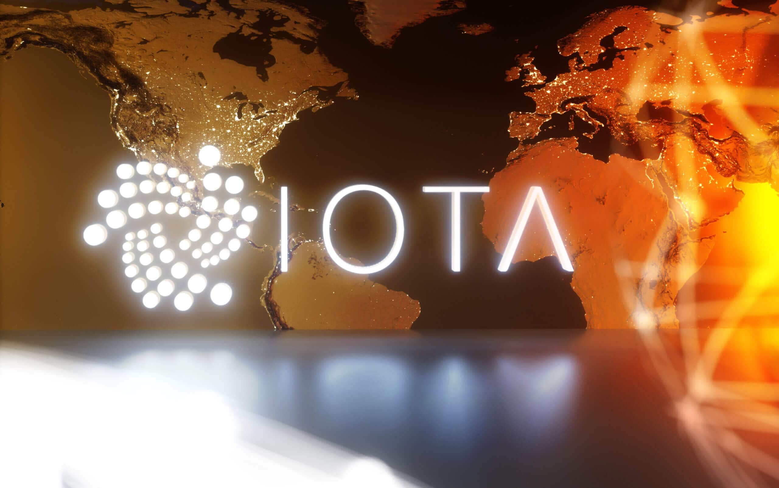 iota logo auf einem hintergrund, der ein stück der weltkarte zeigt