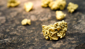 Kleinere Goldnuggets sind verteilt in Anlehnung an das Gold-Portfolio von der Dash Investment Foundation.