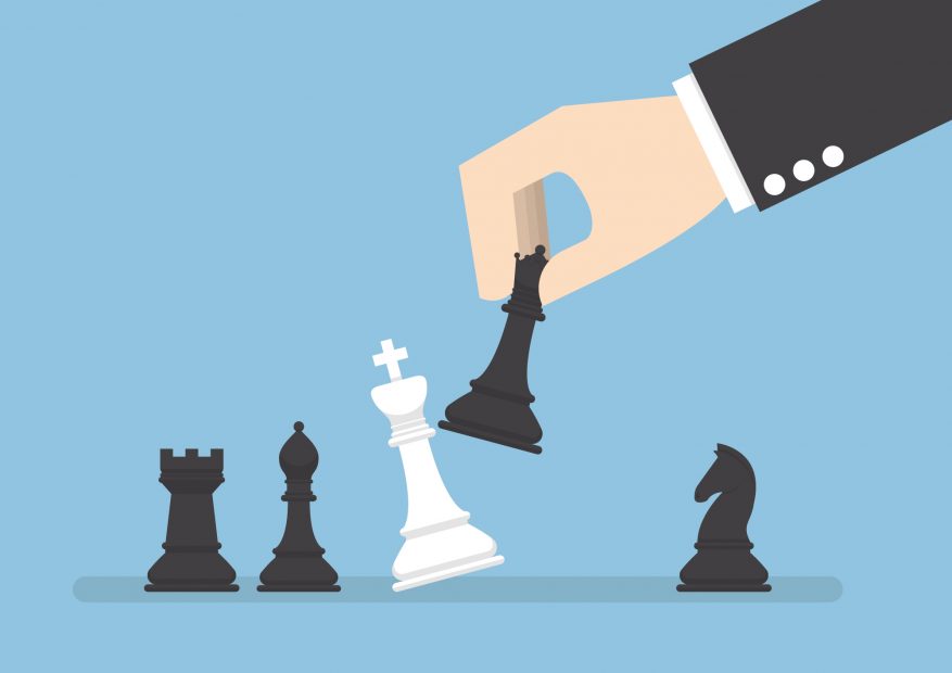 Banken vs. Krypto-Start-ups: Wer in Zukunft wirklich den Kürzeren zieht Die Grafik zeigt eine Schachpartie, in der die weiße Figur Schachmatt gesetzt wird.