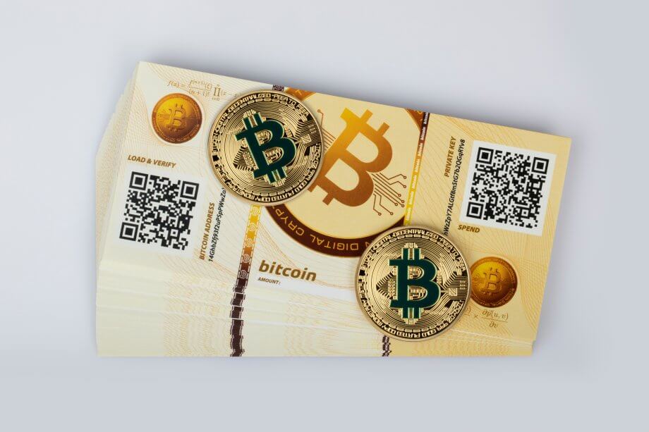 Bitcoin Paper Wallets und zwei physische Bitcoin-Münzen