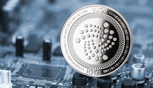 IOTA-Münze auf einem Computerchip