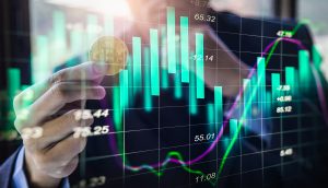 Bitcoin-Münze und Charts