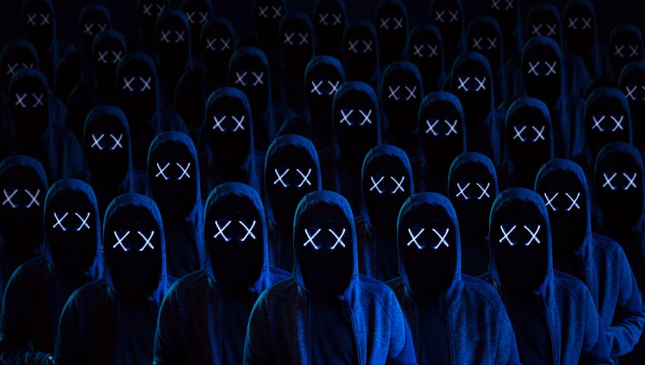 Mitglied der Bitcoin-Erpresser von Dark Overlord verurteilt Eine Armee von Kapuzenträgern