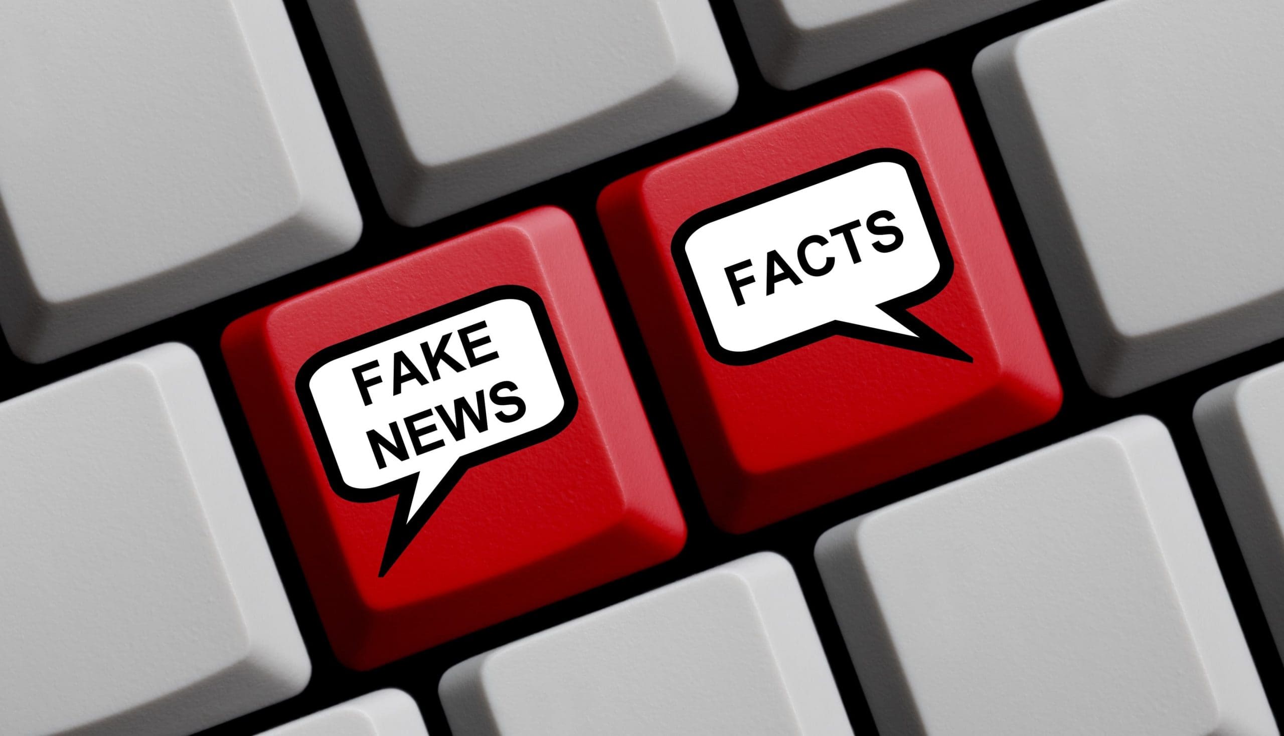 Illustration einer Tastatur mit den Tasten „Fake News“ und „Facts“