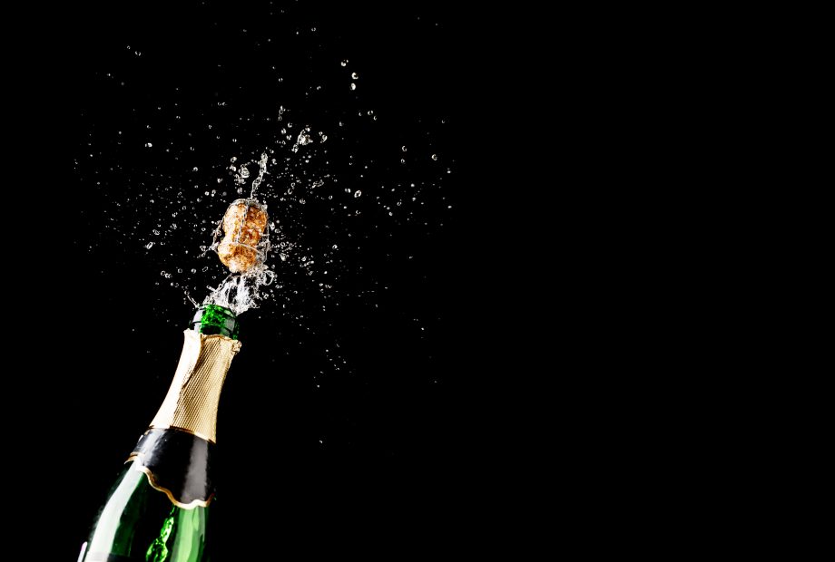 Kryptokompass ab sofort mit Bitcoin, Tether und Dash erhältlich Sektflasche