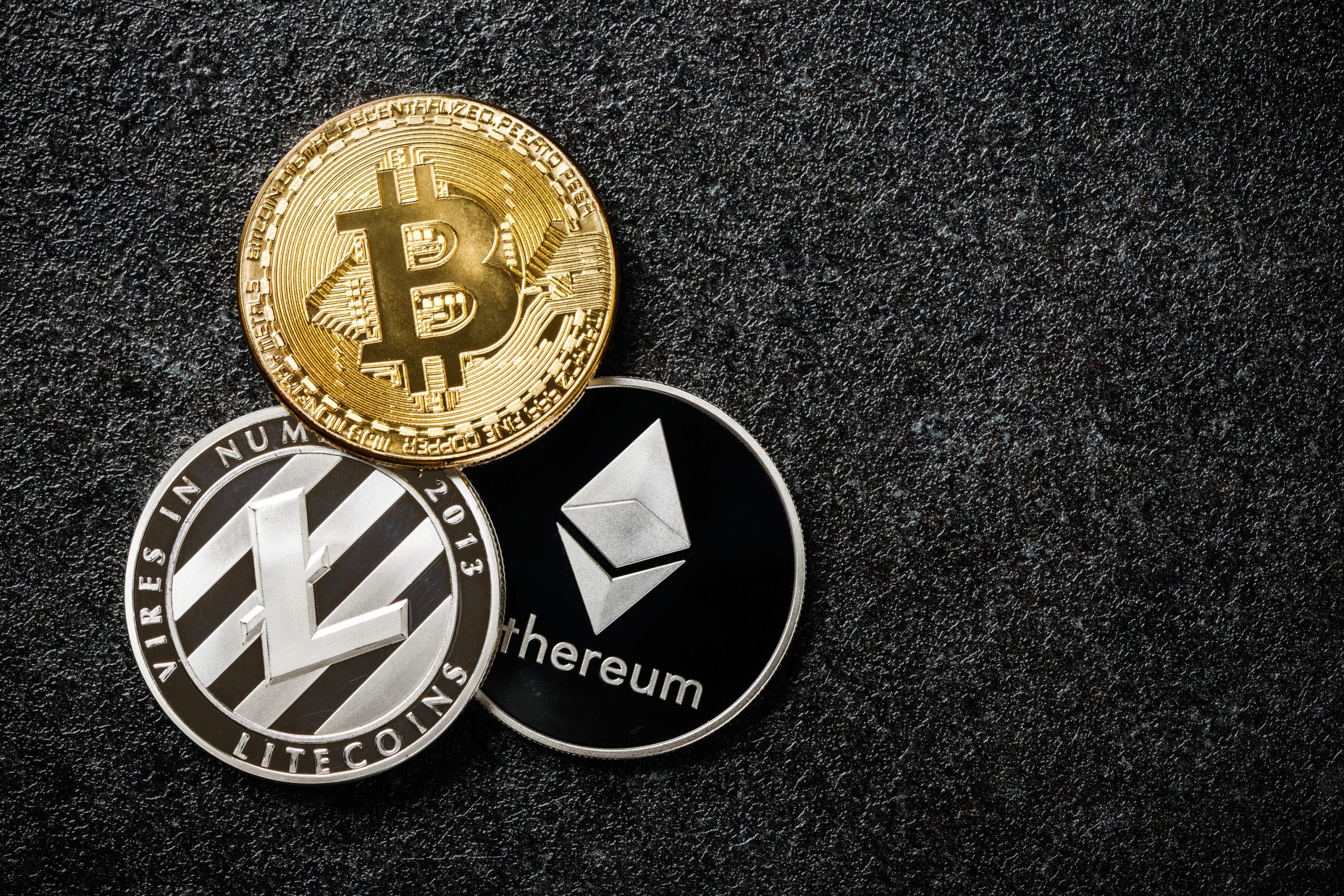 Bitcoin Ethereum und Litecoin Münze