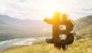 Bitcoin-Logo in Landschaft