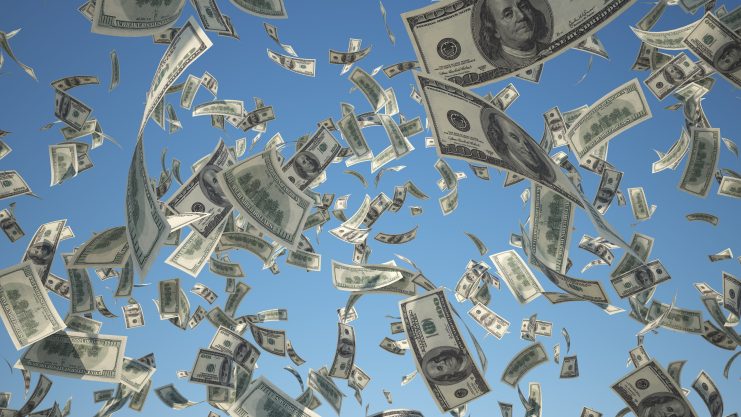 Ein Geldregen von US-Dollar-Noten.