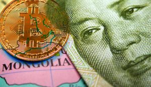 Bitcoin Münze auf Karte