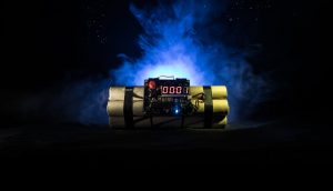eine tickende bombe mit schwarzem hintergrund