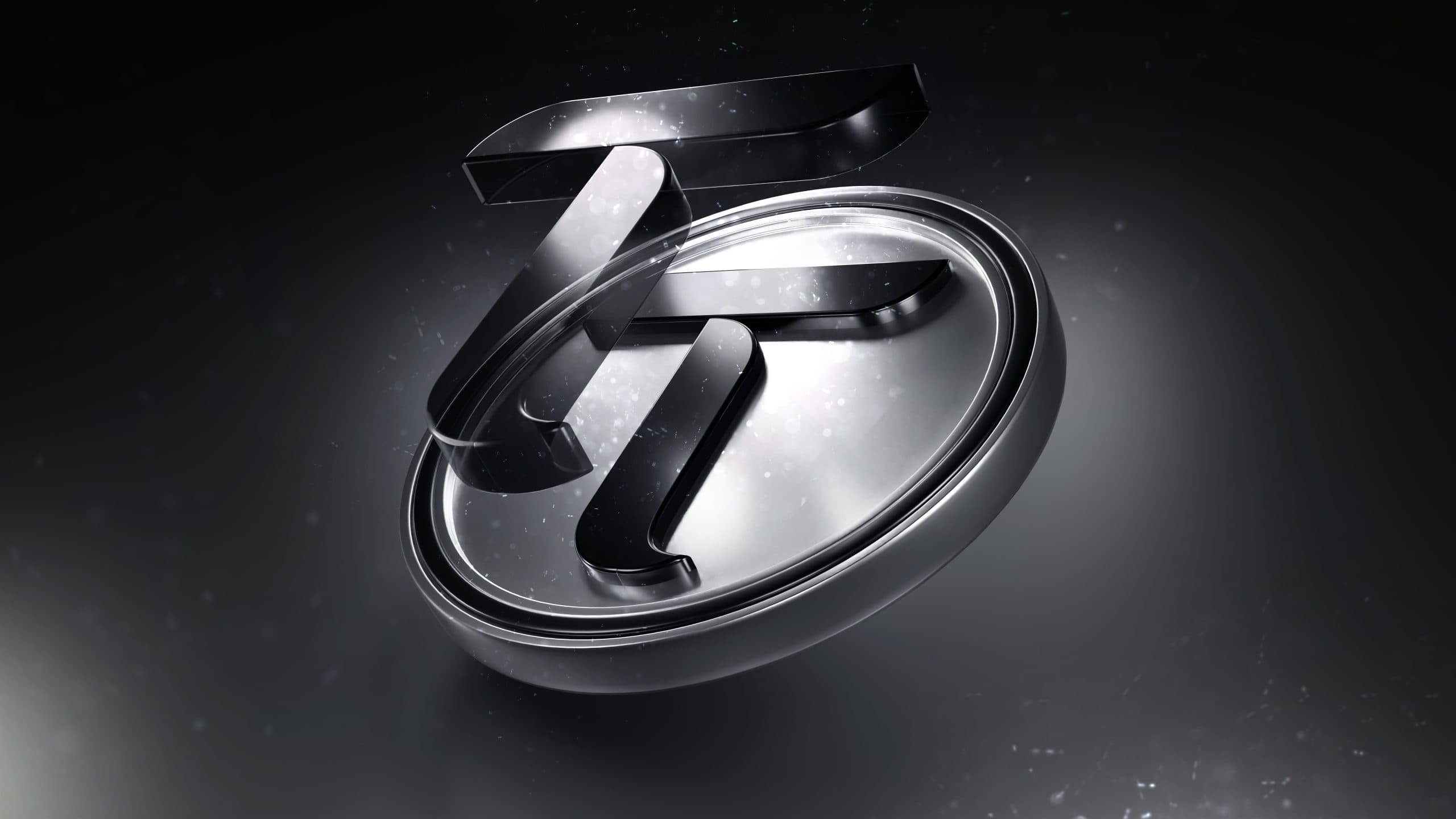 Ein metallisch glänzendes Bittensor-Emblem schwebt vor einem dunklen, leuchtenden Hintergrund.