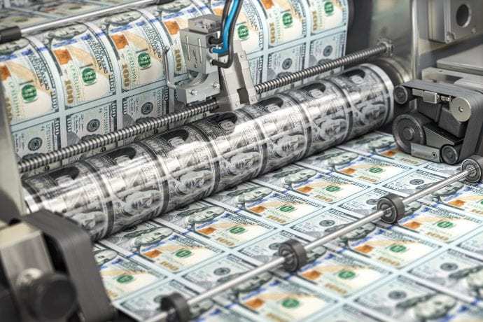 Ein Gelddrucker als Symbol von Inflation