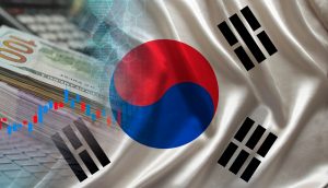 Ein Stapel US-Dollar-Scheine, ein Börsendiagramm und digitale Grafiken überlagern eine südkoreanische Flagge und symbolisieren Finanzen, die Einführung von Stablecoins und die wirtschaftliche Aktivität in Südkorea.