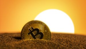 Bitcoin Münze vor einer Sonne