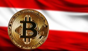 Eine goldene Bitcoin-Münze, die Krypto symbolisiert, ist vor der österreichischen Flagge mit ihren charakteristischen rot-weiß-roten Querstreifen zu sehen.