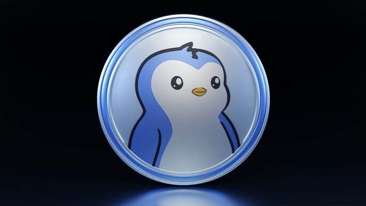 Ein blaues Pinguin-Symbol der Marke Pudgy Penguins auf dunklem Hintergrund