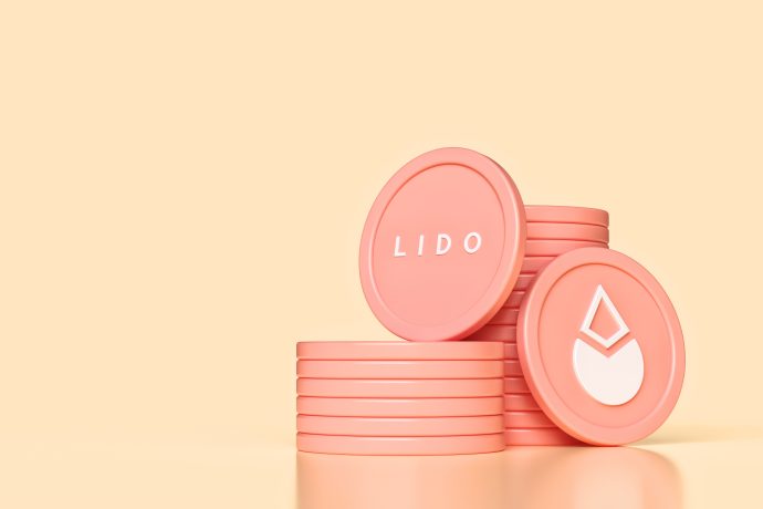 Ein Stapel rosafarbener Münzen mit dem Schriftzug Lido und dem Lido-Logo vor einem hellbeigen Hintergrund zeigt das lebendige Branding von Lido.