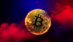 Goldene Bitcoin-Münze vor rotem Hintergrund als Symbol für Kursverluste