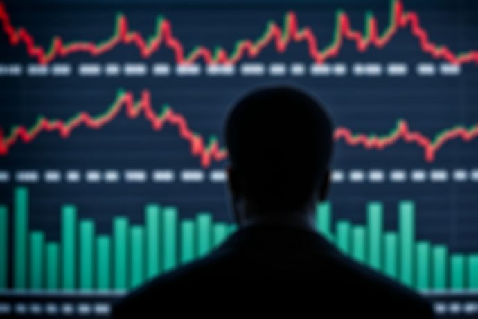 Eine Person blickt auf einen Bildschirm, auf dem rote Liniendiagramme und grüne Balkendiagramme angezeigt werden, die eine Analyse von Finanz- oder Börsendaten auf Plattformen wie Perp DEX oder Hyperliquid nahelegen.