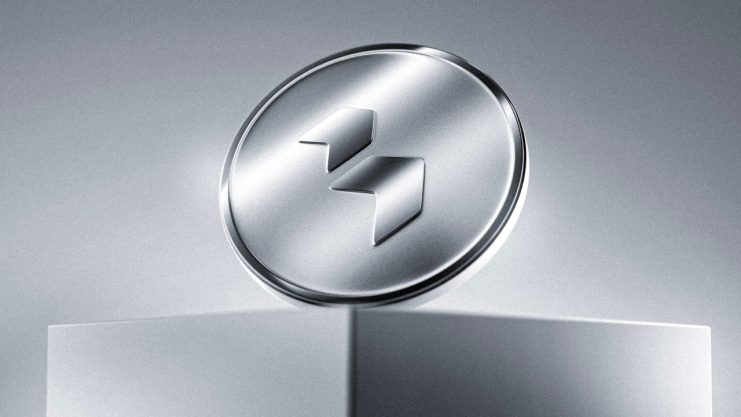 Silberner Coin mit dem Deblock-Logo auf einem Podest – Darstellung des $BLOCK-Utility-Tokens der On-Chain-Banking-Plattform Deblock.
