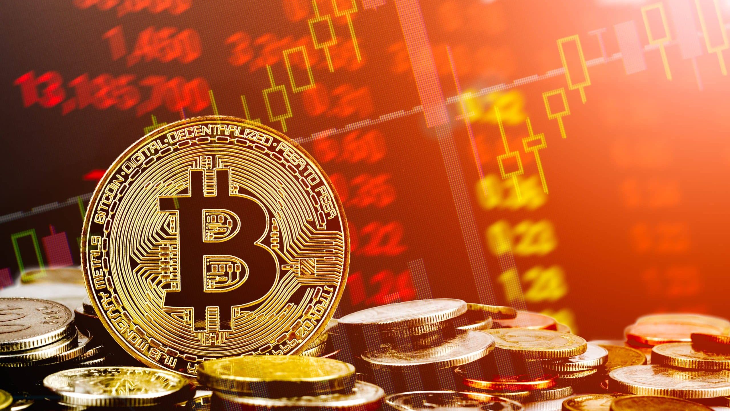 Bitcoin-Münze vor rotem Hintergrund