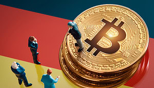 Die Grafik zeigt eine Bitcoin-Münze auf der Deutschland Flagge