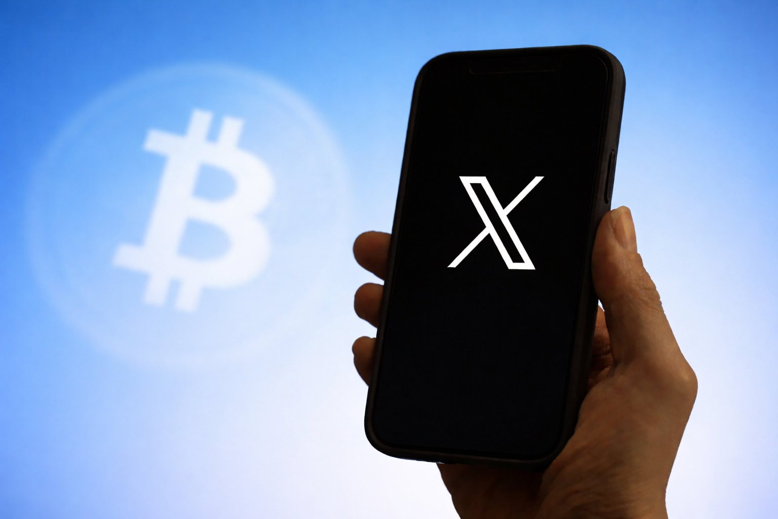 Bitcoin und ein Smartphone mit X