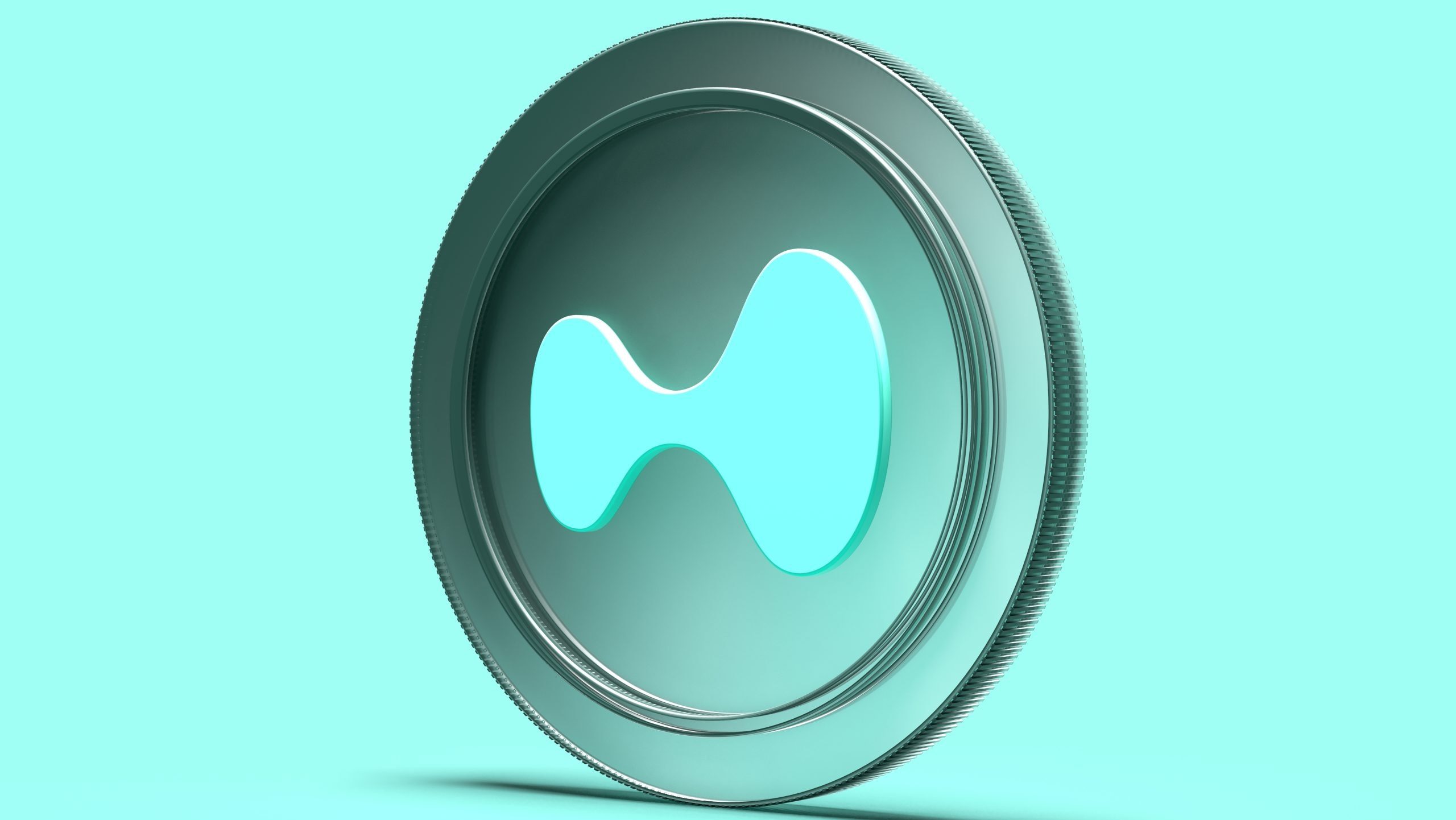 HYPE-Token vor einem grünen Hintergrund