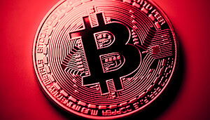 Eine rote Bitcoin-Münze