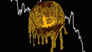 Bitcoin-Münze vor fallendem Chart