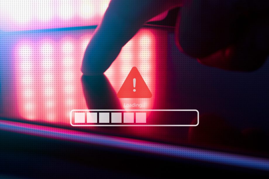 Ein Finger auf einem Laptop