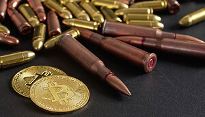 Das Bild zeigt eine Bitcoin-Münze vor Patronen