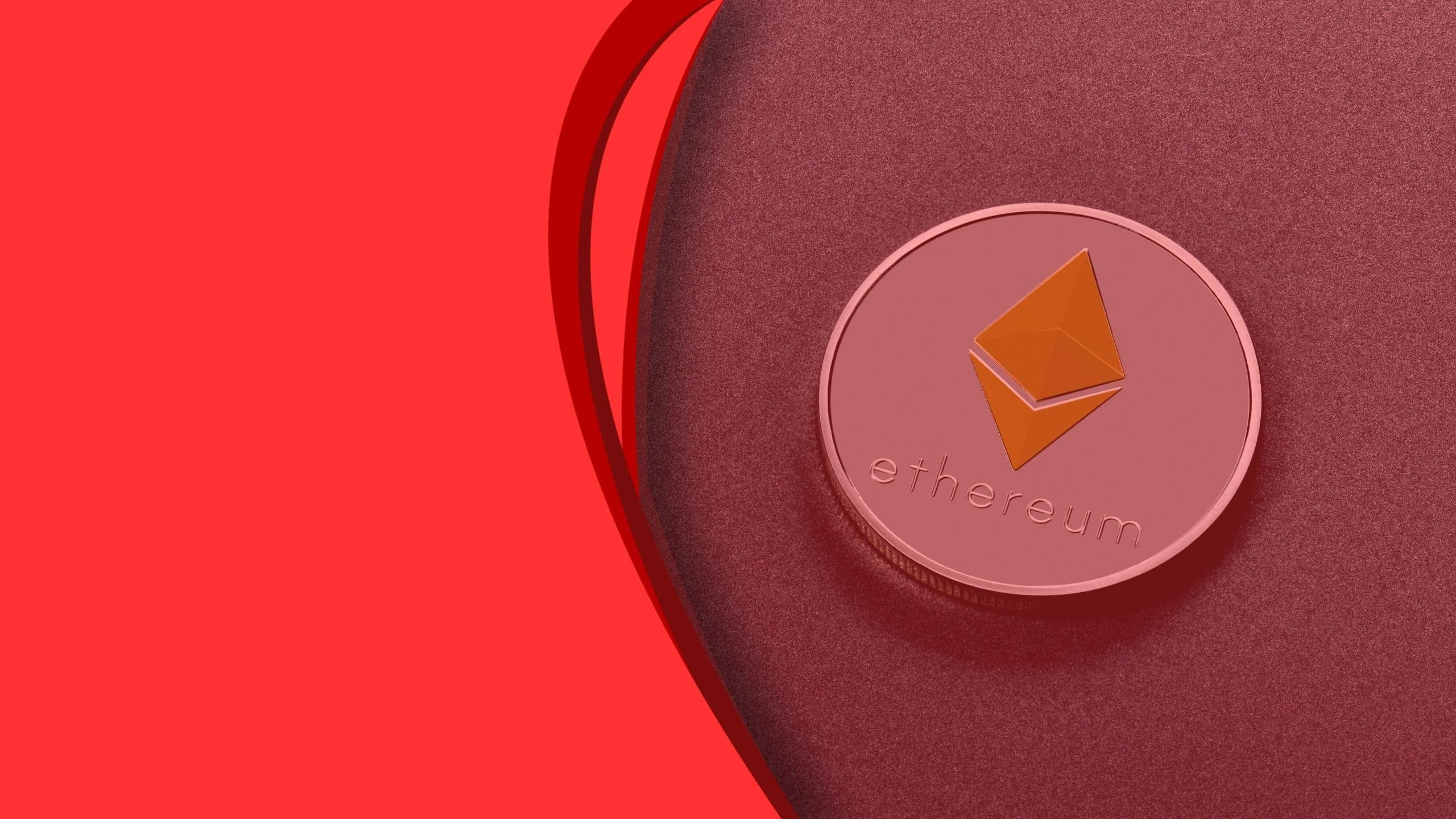 Das Bild zeigt eine Ethereum-Münze auf rotem Hintergrund.