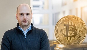 Professor Co-Pierre Georg und Bitcoin-Münze