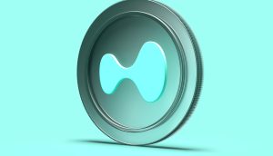 Ein stilisiertes, türkisfarbenes Coin-Logo von Hyperliquid ist vor einem einfarbigen Hintergrund zu sehen.
