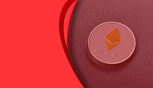 Das Bild zeigt eine Ethereum-Münze auf rotem Hintergrund.