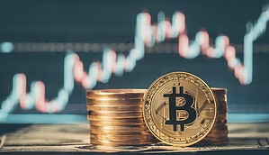 Das Bild zeigt eine Bitcoin-Münze.