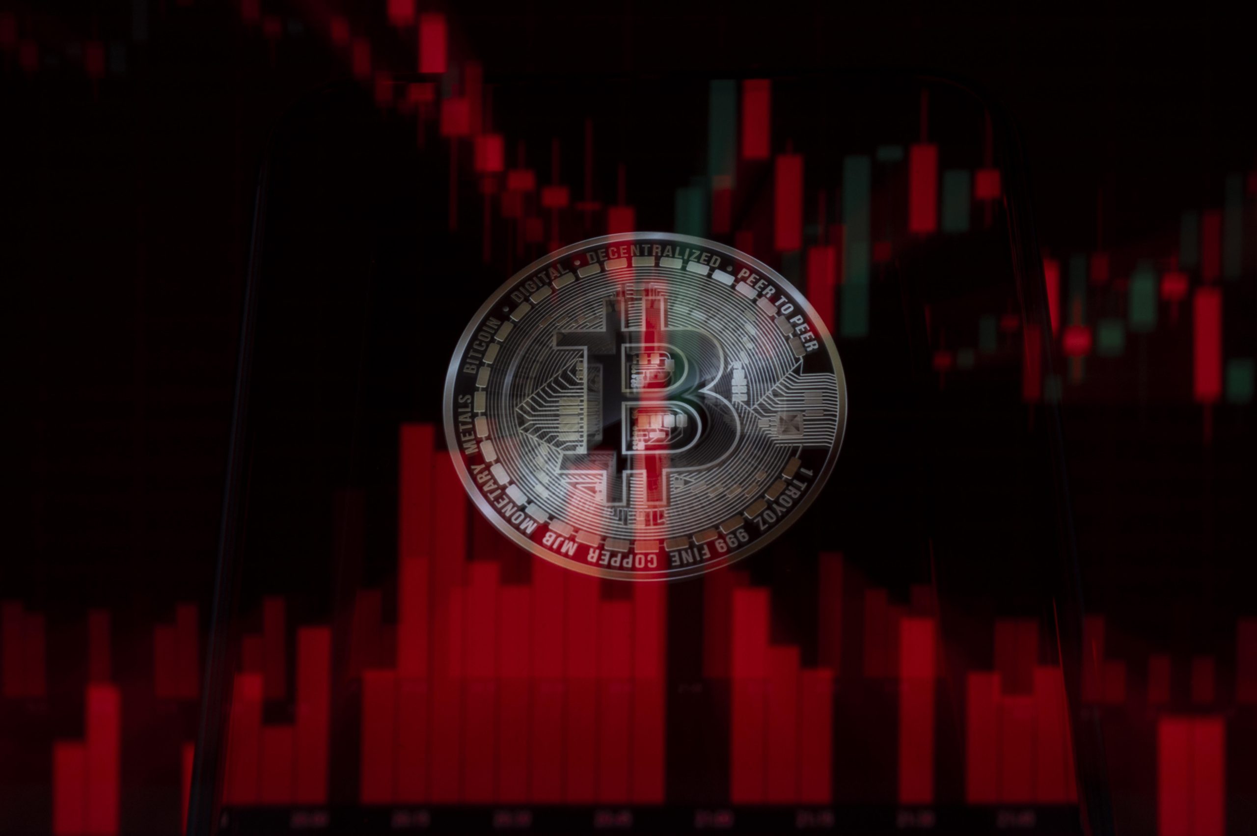 Eine rote Bitcoin-Münze