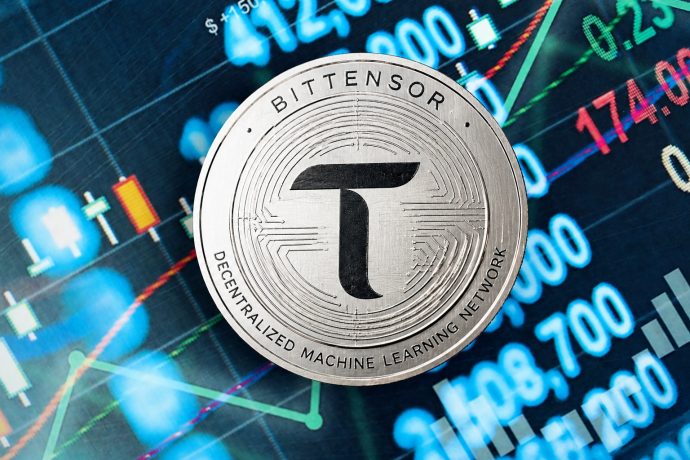 Eine Bittensor-Münze vor einem Chart.